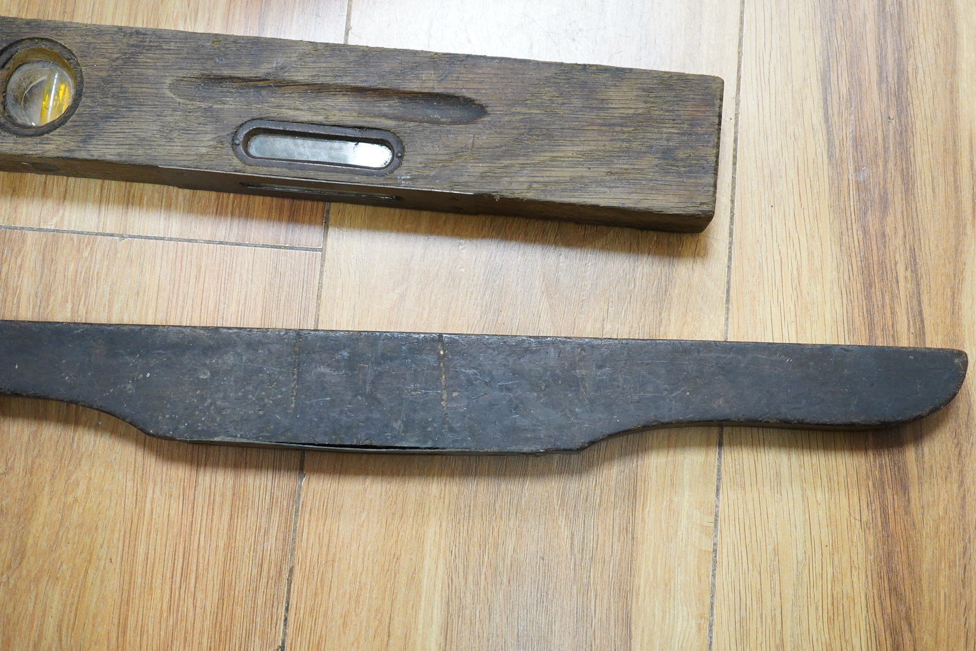 A group of levels, and an Indian knife and fork set - 43cm long